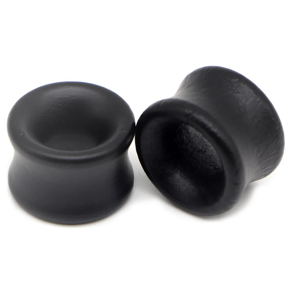 Pair of hollow black wood saddle-fit ear tunnels