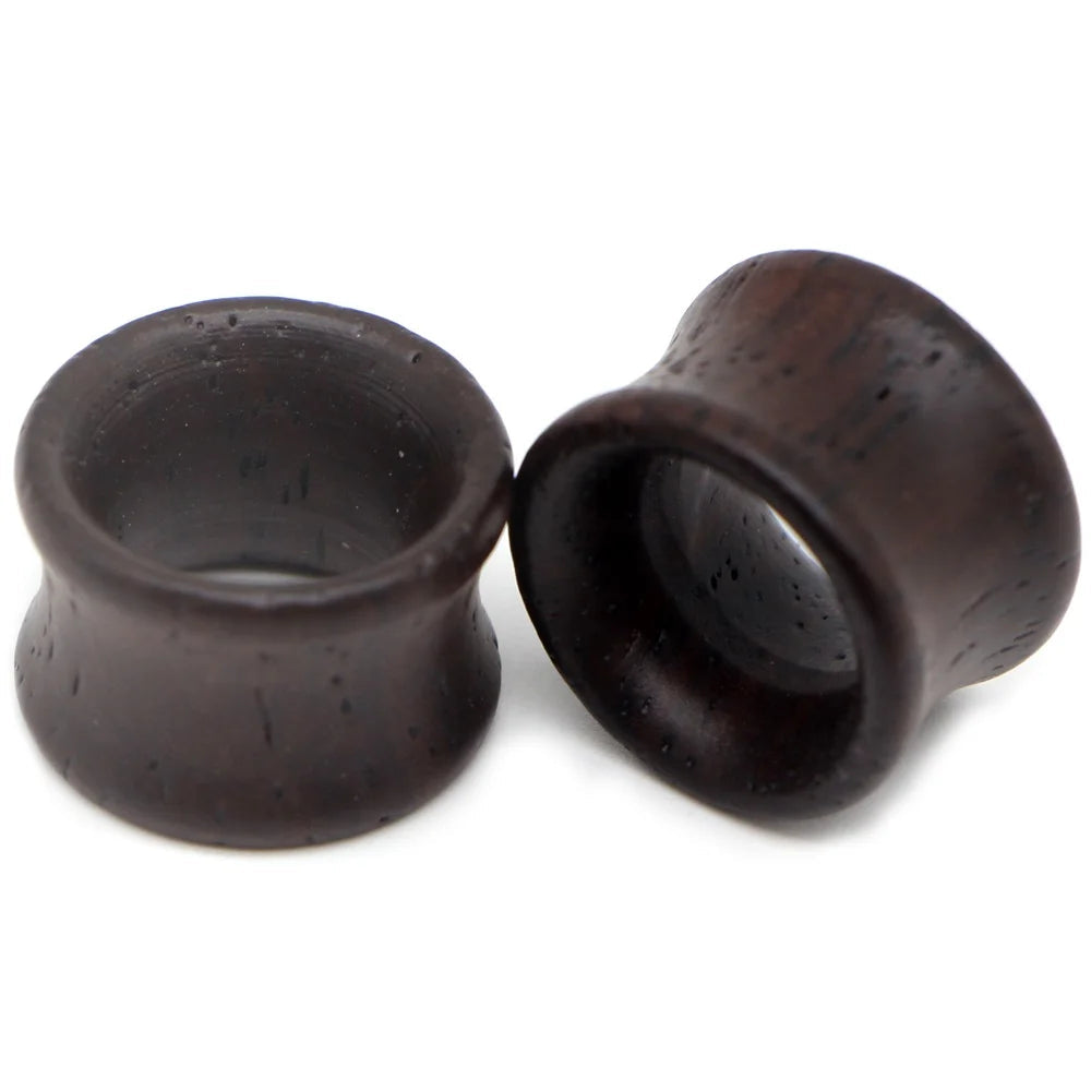 Pair of hollow brown wood saddle-fit ear tunnels