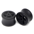Pair of wood saddle-fit ear plugs with a black star inlay