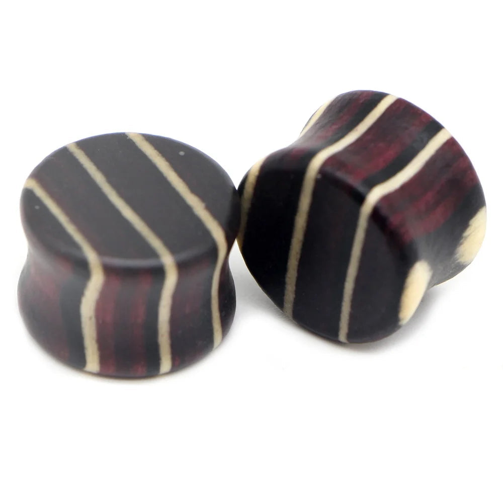 Pair of wood saddle-fit ear plugs with a colorful inlay pattern