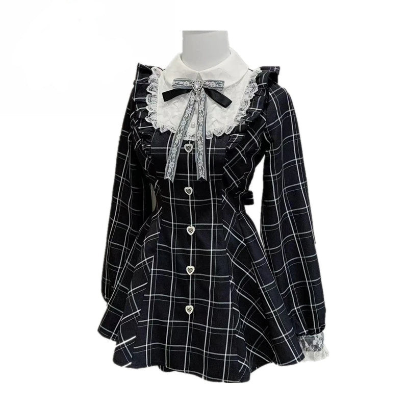 Plaid dress with lace trim and a bow detail