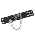 Wide black PU leather cuff with a silver skeleton-hand centerpiece and a draped silver curb chain.