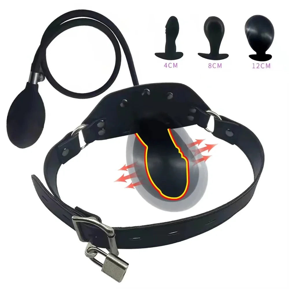 A black lockable silicone penis mouth gag with adjustable leather strap and buckle, shown against a plain white background.