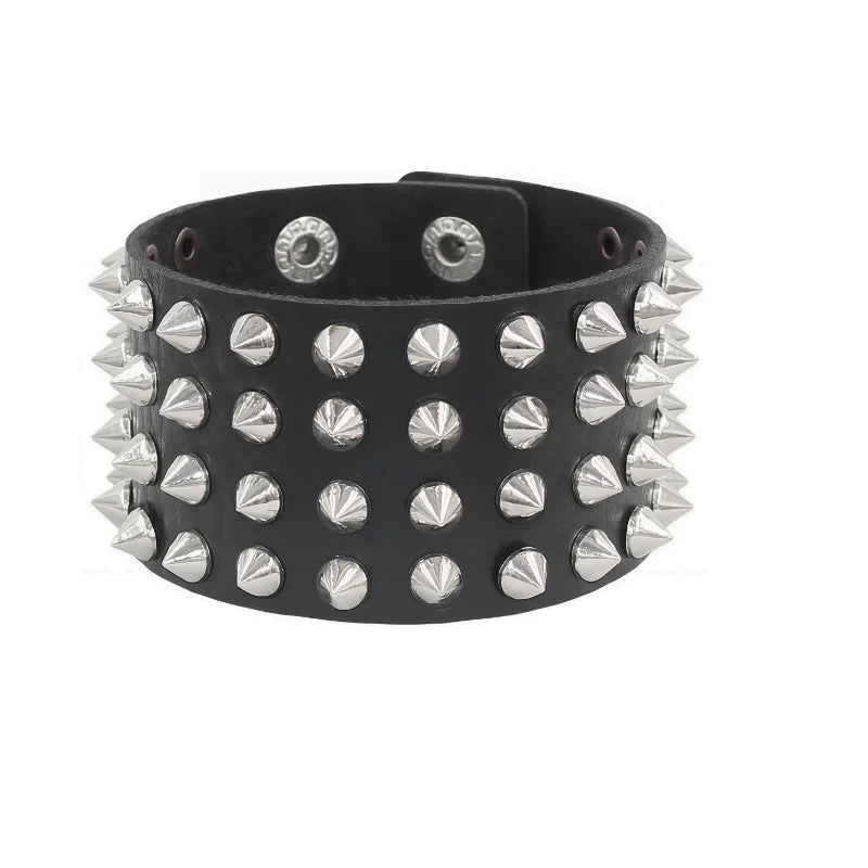 Black PU leather cuff packed with four rows of silver cone spikes on a wide band.