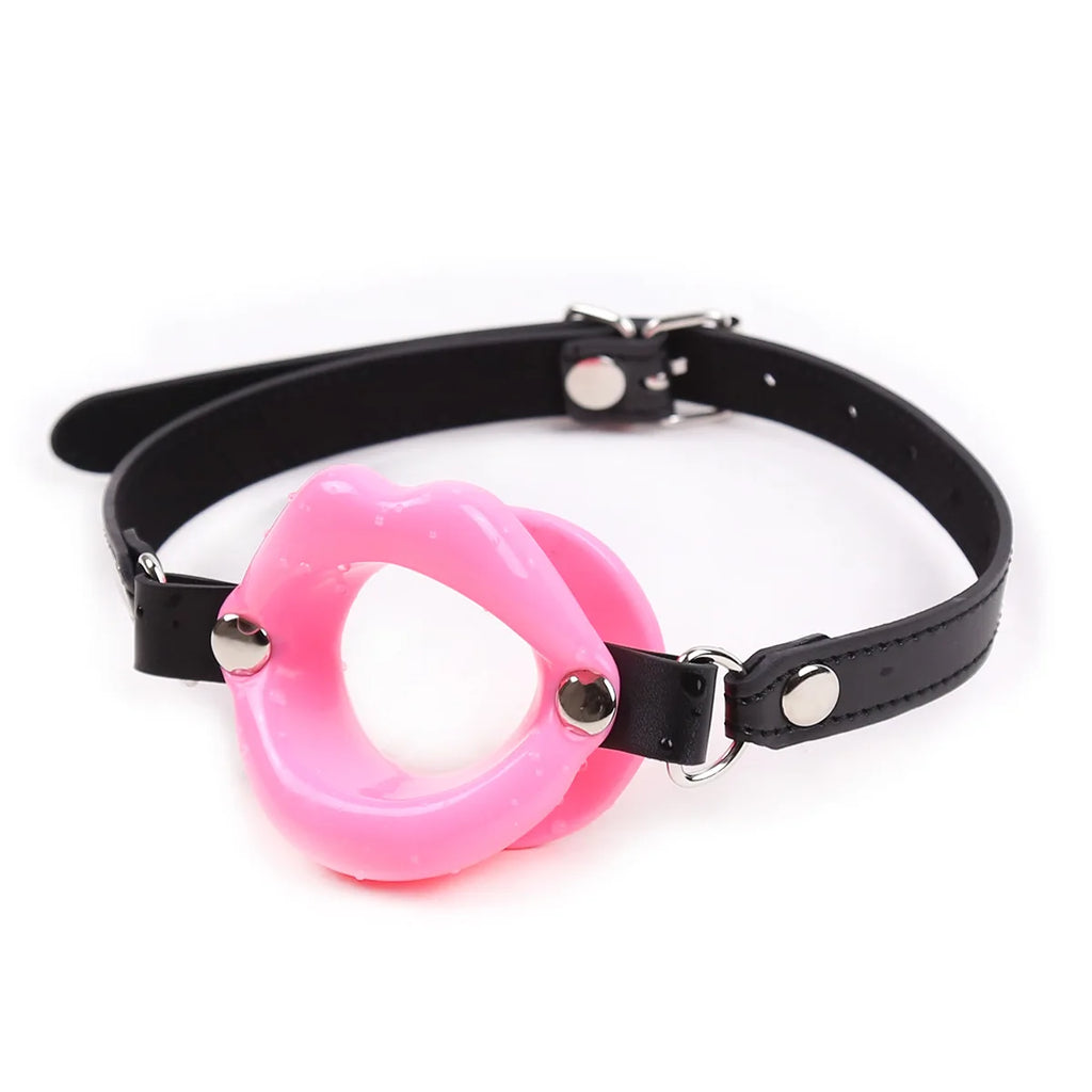 Pink silicone lips open-mouth gag on an adjustable black strap