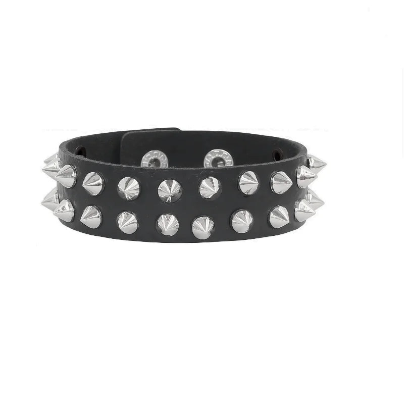 Black PU leather cuff set with two rows of pointed silver cone spikes.