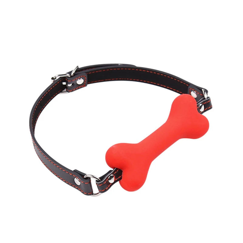 Red silicone bone-shaped gag on a black strap with red stitching