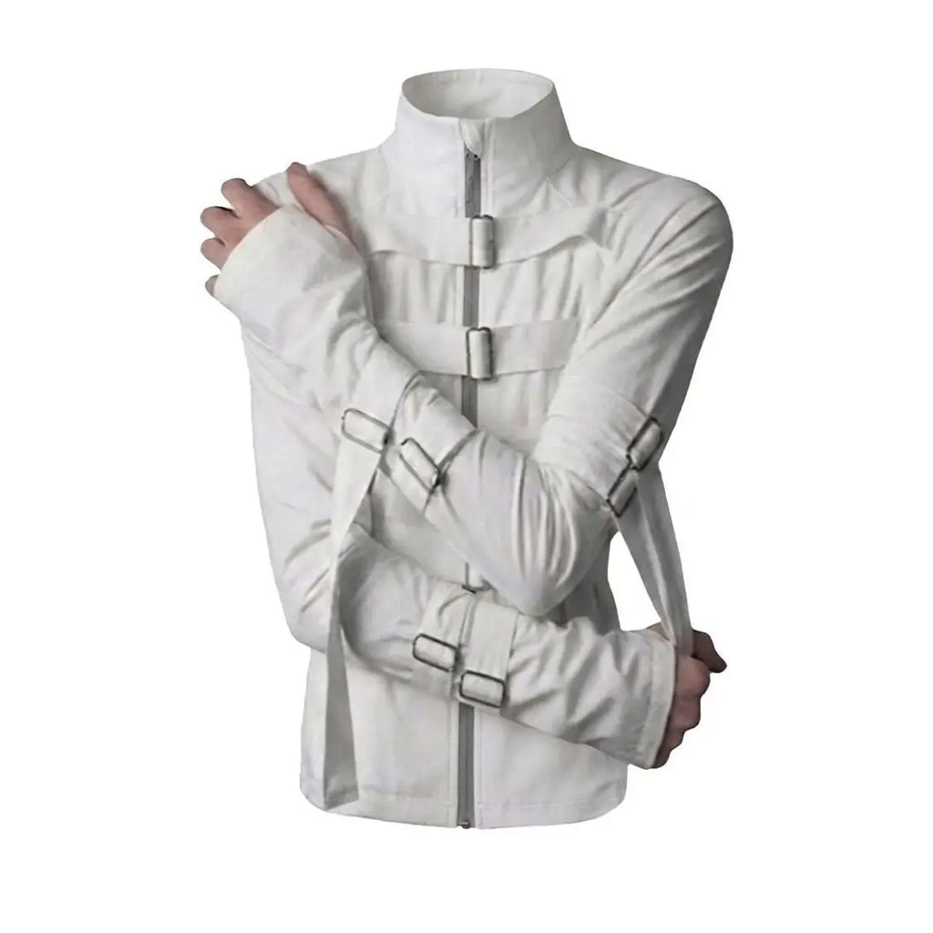A white buckle strap asylum jacket with tall collar, metal buckle straps across the chest and crossed arms, shown against a black background.