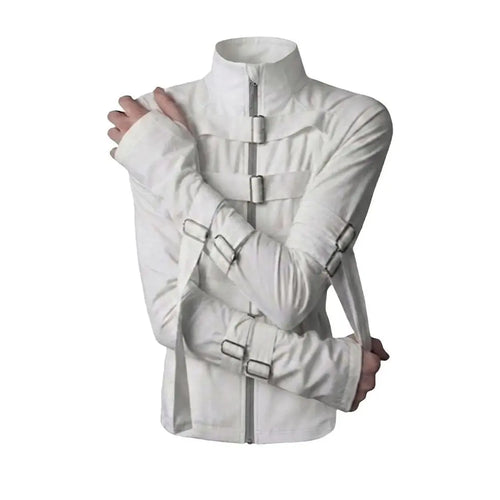 A white buckle strap asylum jacket with tall collar, metal buckle straps across the chest and crossed arms, shown against a black background.