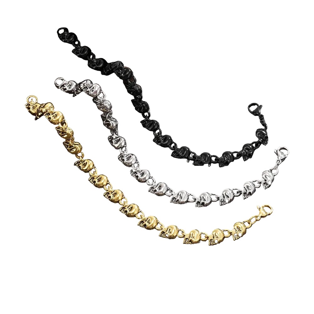 Metal chain bracelet with skull charms