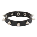 Slim black PU leather cuff with a single row of tall silver cone spikes.