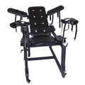 A padded restraint chair built on an adjustable black metal frame.