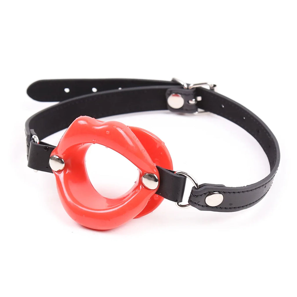 Red silicone lips open-mouth gag on an adjustable black strap