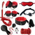 Ten-piece red and black bondage kit with cuffs, gag, whip, and accessories