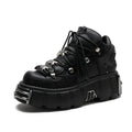 A pair of black platform lace-up sneakers with metal hardware and a 6cm sole, shown against a plain white background.