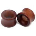 Pair of hollow red wood saddle-fit earring plugs